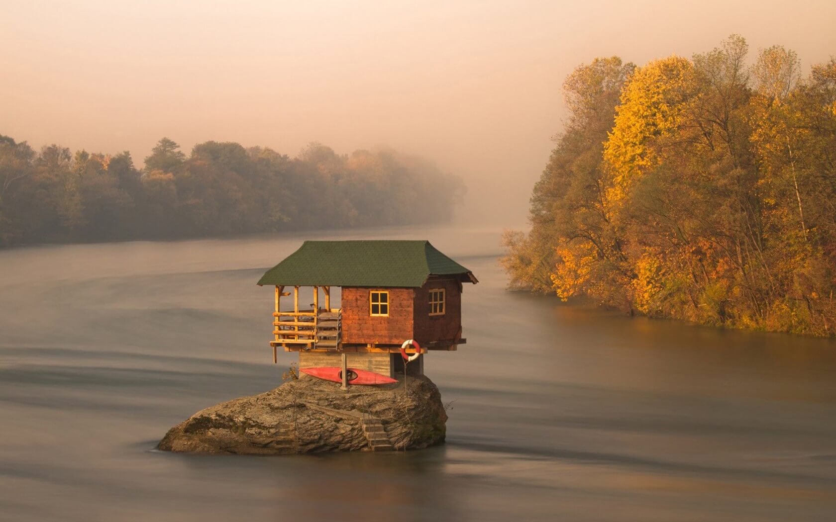 landscape of a cabin in a lake