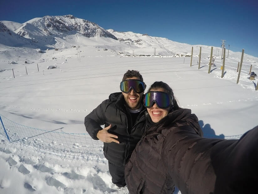 couple enjoying their time in the mountain