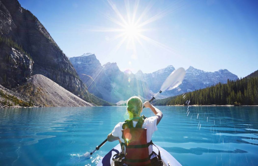 woman canoeing in Canada
