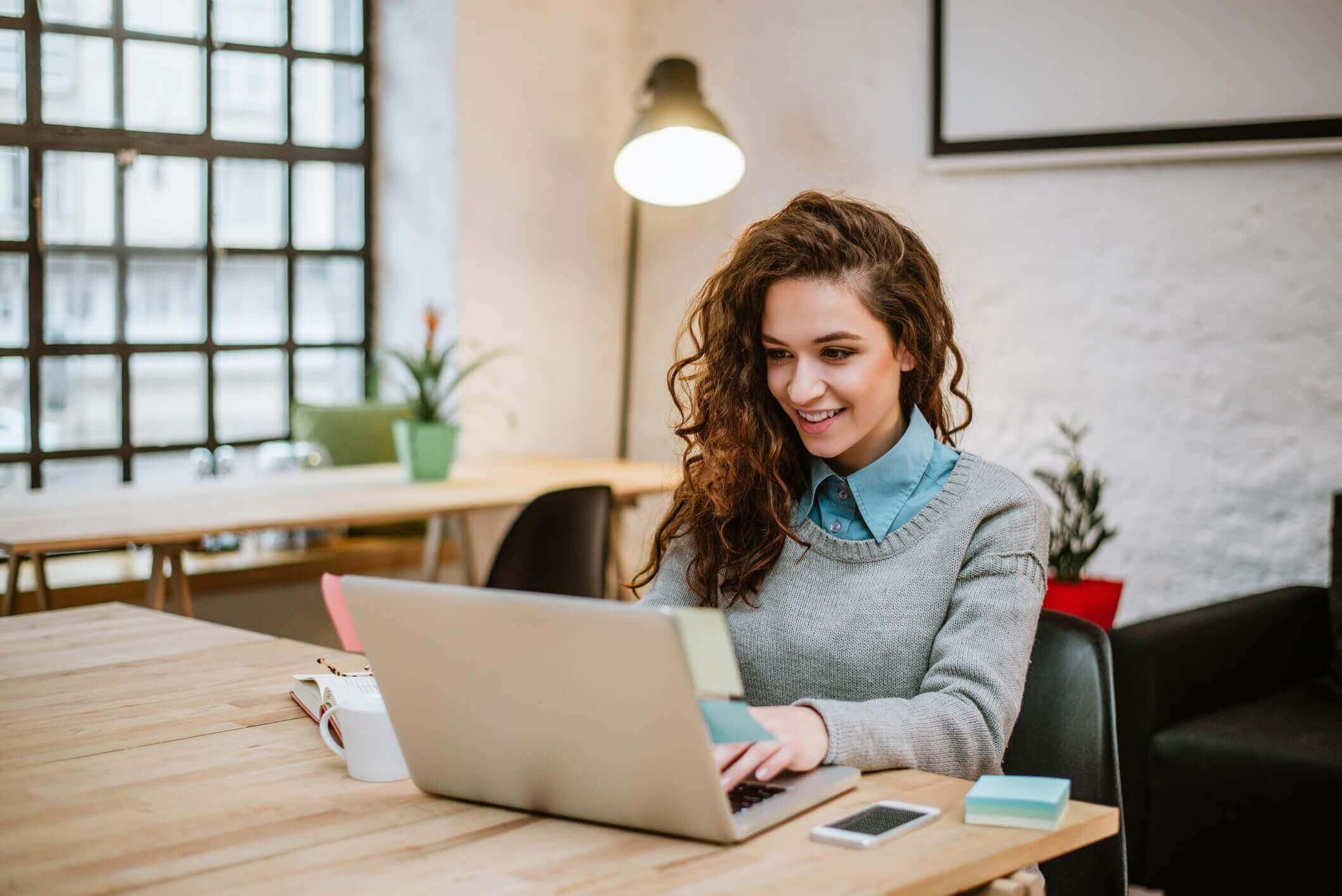 woman working on her laptop