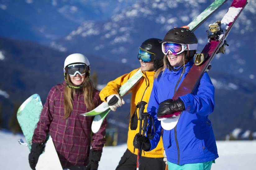 friends skiing in a Canadian resort