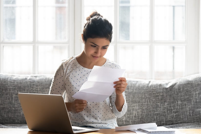 student looking at a tax return