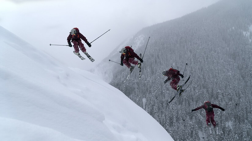 a group of people skiing in Canada